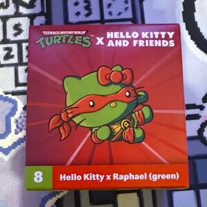 Hello Kitty x TMNT Green and Red Figure